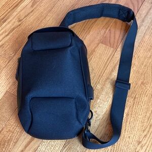 Black Belt Bag with Adjustable Strap and Compact Design